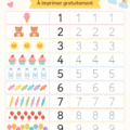 Femme et enfant utilisant une feuille d'exercice de traçage de chiffres