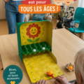 Une famille jouant ensemble dans un espace de jeu coloré et accueillant.