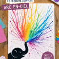 Enfant créant un éléphant en peinture soufflée arc-en-ciel sur une toile.