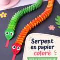 Un serpent en papier coloré réalisé par des enfants, illustrant une activité manuelle créative.