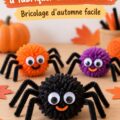 Une araignée en pompons colorés fabriquée par des enfants, mettant en avant la créativité.